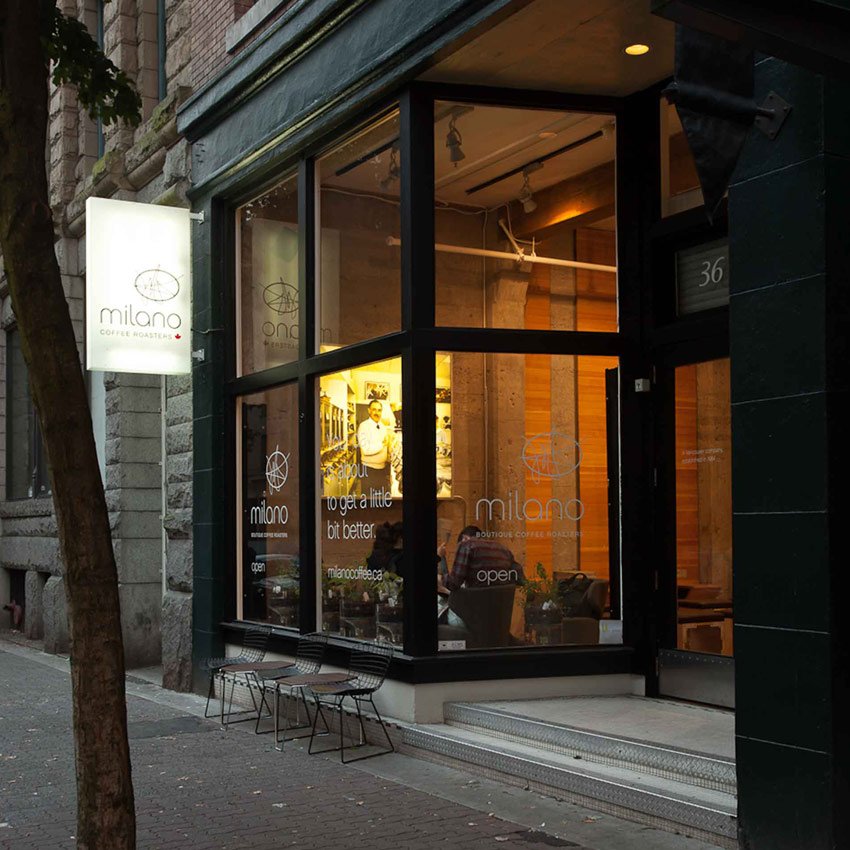 Espresso Lounge — Glazed café entrance viewed from the street