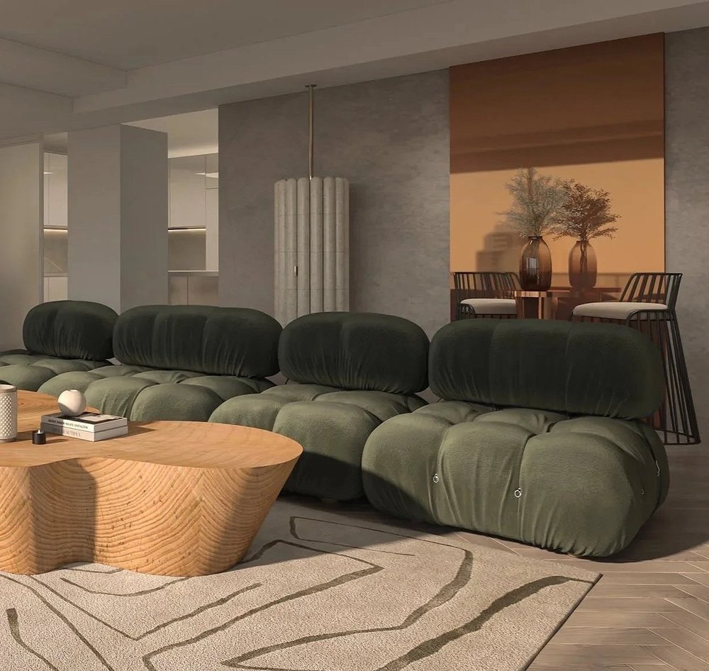 Vancouver House — Green modular sofa and timber tables beside a sunlit window