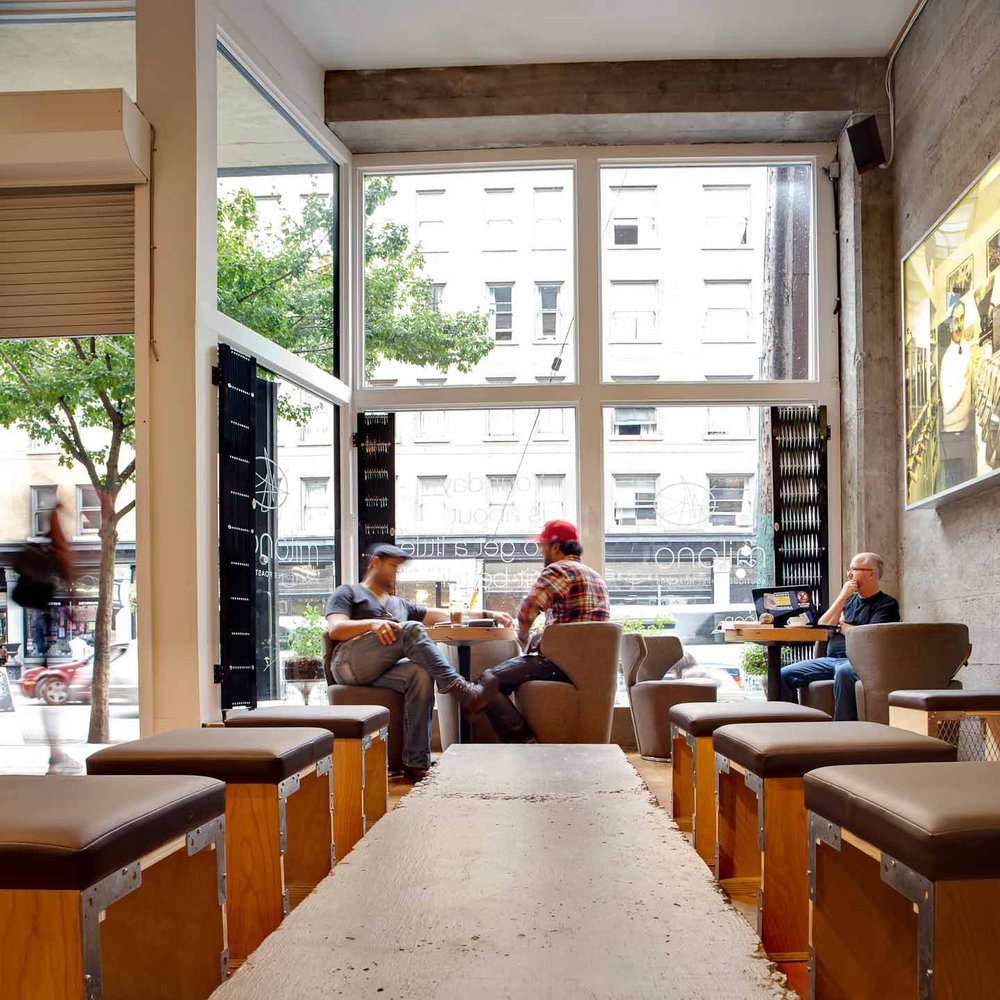Espresso Lounge — Coffee lounge seating overlooking the street